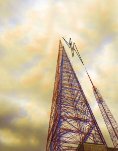 Low angle view of radio tower and signal