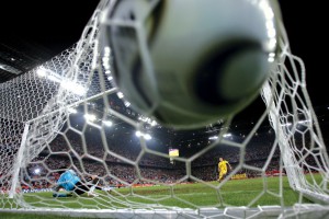 Pascal Zuberbuehler (L) from Switzerland cannot save the penalty shot of...