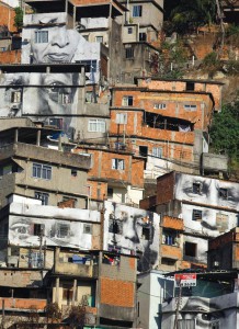 Giant photographs of women cover the walls of homes in favela Providencia in Rio de Janeiro